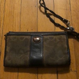 Brown Coach leather wristlet